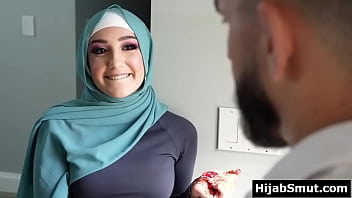 Youthful muslim lady instructed by her soccer coach